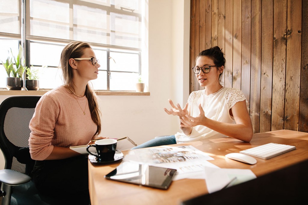 2 Women talking about Business