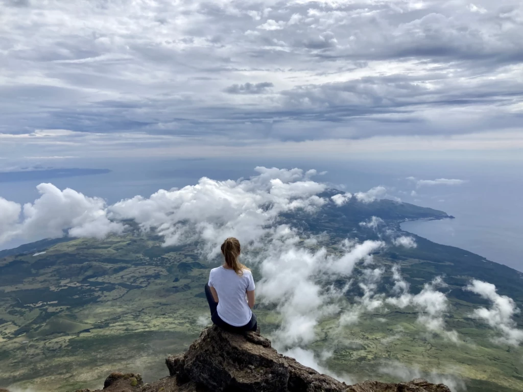 Woman in a top of Mountain